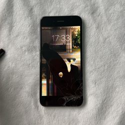 iPhone 6 in Space Gray. Screen cracked + locked