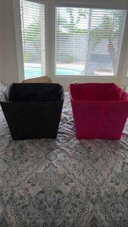 Collapsible pink and brown cloth baskets