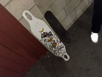 Longboard Deck with Skull Graphic