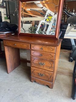 Dresser with detached mirror.