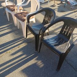 Four Plastic Outside Chairs