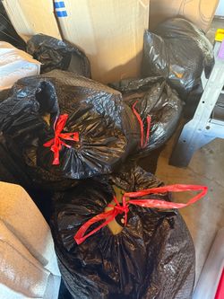 Six bags of clothes, shoes,