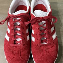 Ladies Red Adidas Gazelle sneakers - like new - worn once.  The tag says US 5 but they fit like a 7.5.