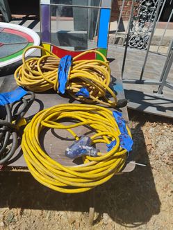 2 yellow 50 & 100 feet long cords