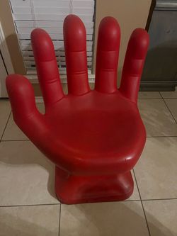 Red Giant Hand-Shaped Chair