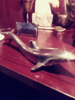 Solid brass dolphin bottle opener