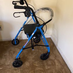 Walker - new , fully assembled, folds up 