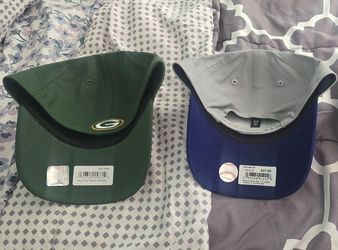 Los Angeles Dodgers and Green Bay Packers hats