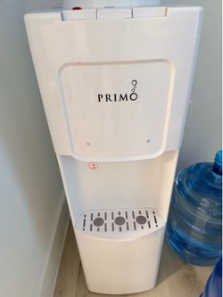 Primo Hot and Cold Water Dispenser + 3 5gallons bottle with reusable lid for refilling . Like new