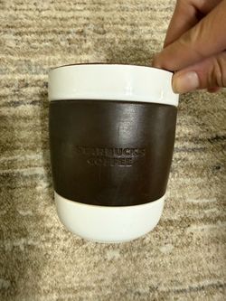 Ceramic Starbucks mug with leather sleeve