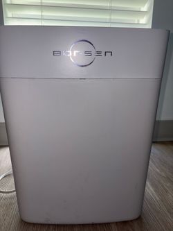 Bonsen, home/office cross-cut paper shredder with an integrated wastebasket.