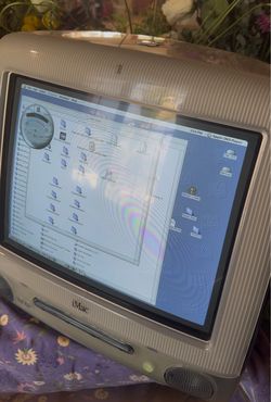 Transluscent blue iMac G3 with keyboard and mouse , functional
