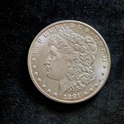 1881 CC Morgan Silver Dollar. Nice High Grade Coin. Looks Almost Uncirculated.
