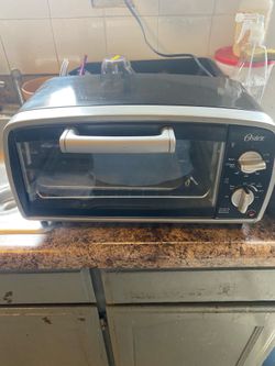 Oster Toaster Oven, 4 Slice, Black (TSSTTVVG01