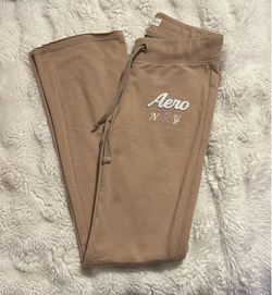 Woman’s tan low rise Aeropostale sweats