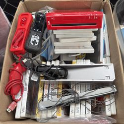 Nintendo Wii, with several games included