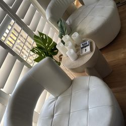 TWO White Leather Chairs - they Spin/Swivel