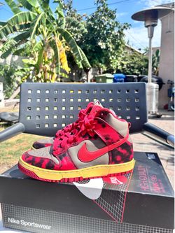 The Nike Dunk High 1985 "Red Acid Wash Size 8 men’s *worn