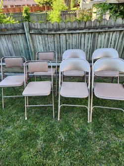 Seven Heavy-duty Samsonite Folding Chairs