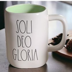Rae dunn soli deo Gloria mug.
New without tag. bottom has some scuffing .