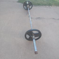 Olympic  Bar And Weight...70lbs.......200 Cash