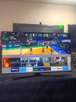 55 inch curved tv Samsung 4k smart tv beautiful tv comes with remote control shows great quality clear picture works perfect guaranteed