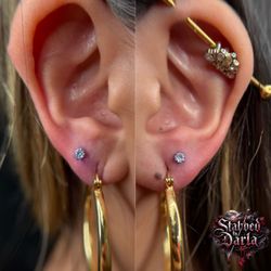 Piercings , tooth gems , teeth whitening