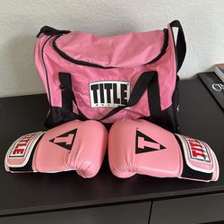 12oz pink Title Boxing gloves and bag