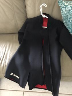 Women's 8T. And Men's LG wetsuit.