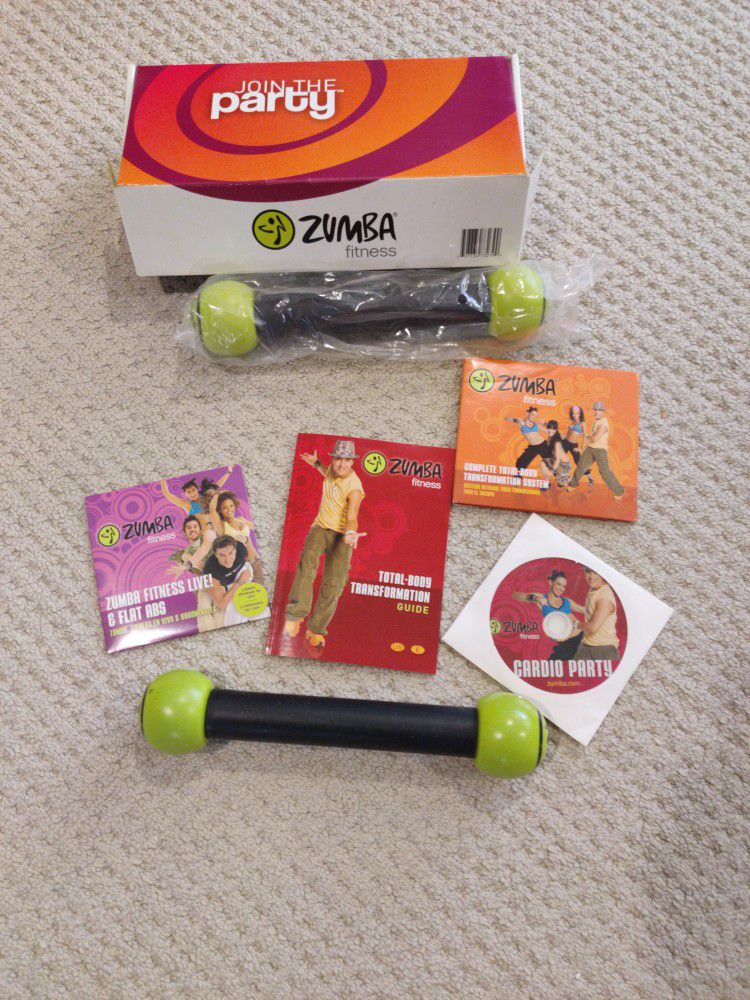 Zumba Fitness Total Body Transformation System DVD set - With 4 DVDs And 2 'Toning Sticks'
