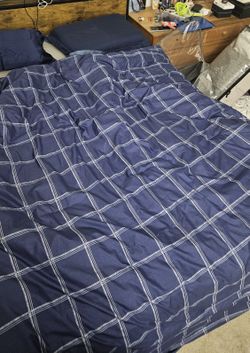 Navy blue and white checkered comforter