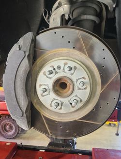 Brakes pads and rotors front and rear slotted rotors