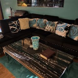 Black Sectional With Ottoman, coffee Table, Two End Tables.