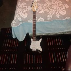 Carlson-brand electric guitar