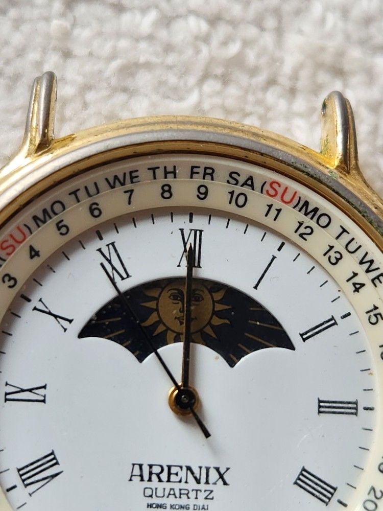 Vintage Arenix Quartz Hong Kong Dial Japan movement Sun Moon Phase movement on top Roman Numerals Day and Dates around outside of watch adjustable for Sale in Duluth GA OfferUp