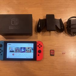 Nintendo Switch w/ Dock, Joy-Cons, Charger + Mario Odyssey – Works Perfect