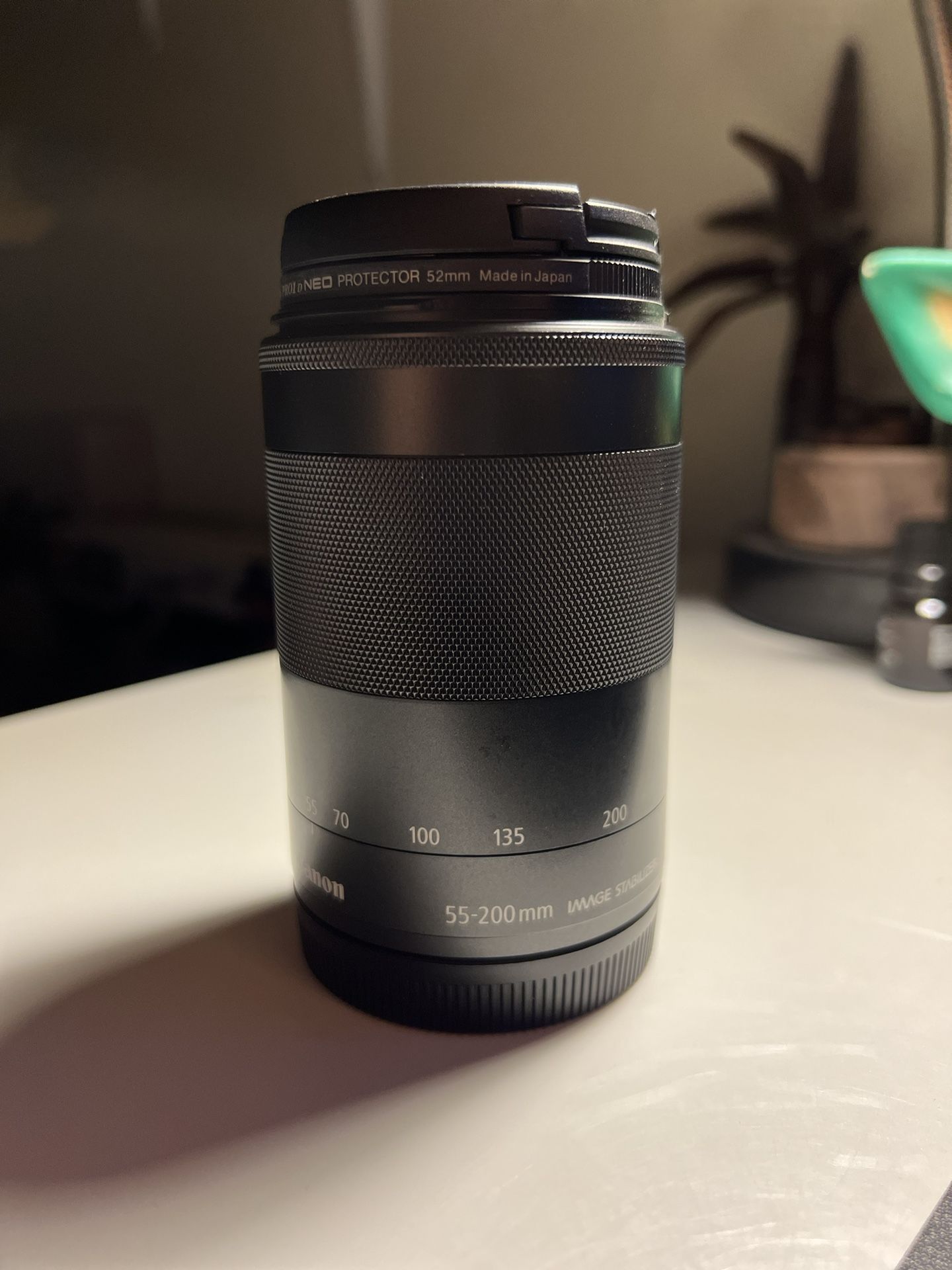 Canon 55-200mm EFM tf4.5-6.3  telephoto lens