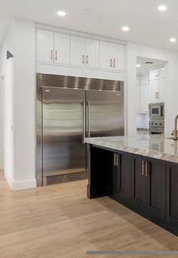 Electrolux Built-in, side-by- side fridge and freezer