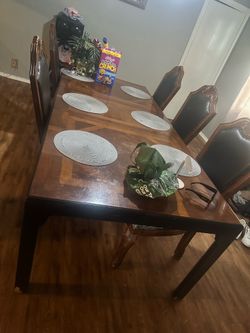 Dinning table and 6 chairs