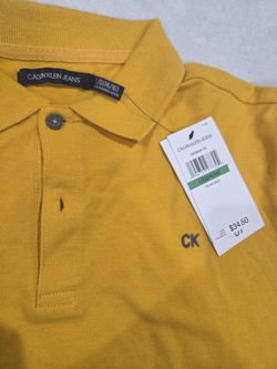 Gold polo shirt