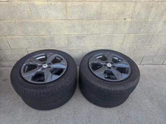 Selling a complete set of 4 original OEM Ford Mustang Mach-E wheels Lightly Used