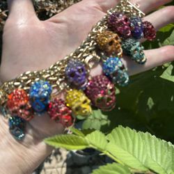 Multicolored Rhinestone Skull Bracelet with gold tone chain bracelet and adjustable length