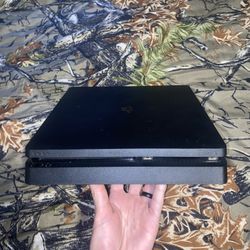 PS4 Slim , All Black , Comes With 2 Controllers ,games Already Downloaded On It 