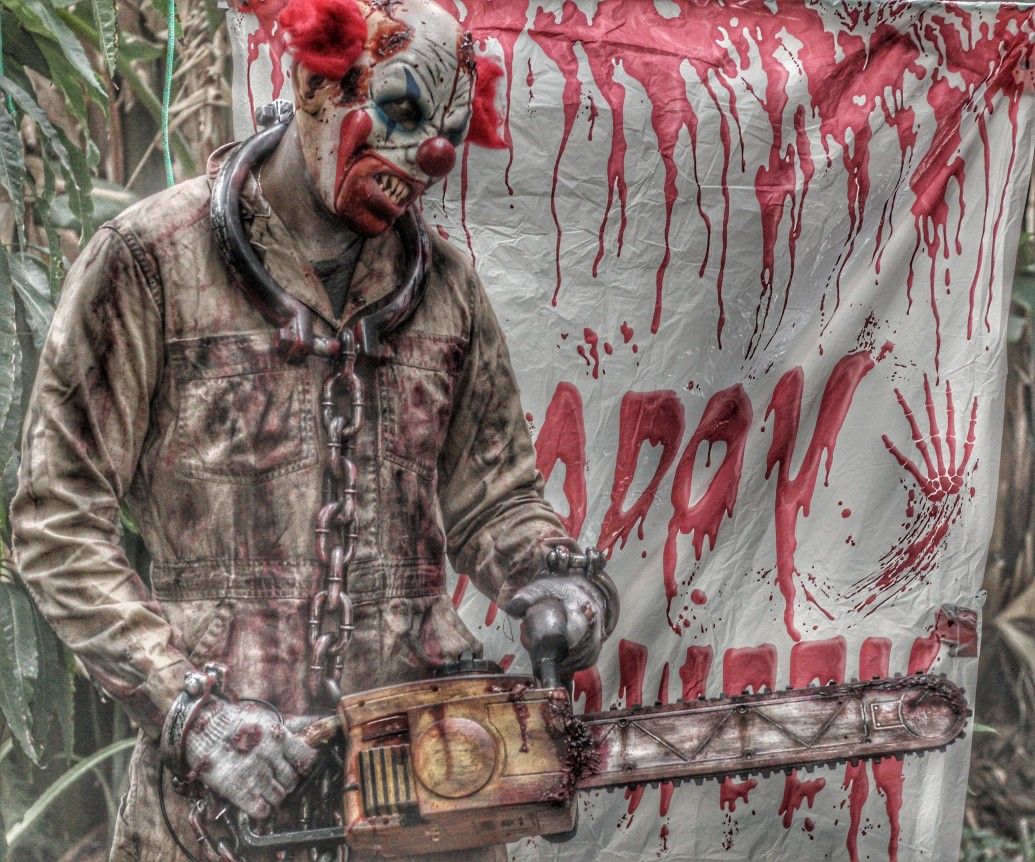 Clown Halloween costume with custom chainsaw