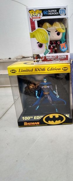 Collectible Batman statue with Harley Quinn Funko Pop