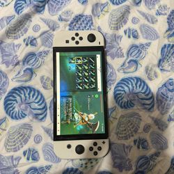 Nintendo Switch OLED with Control And Travel Case. 