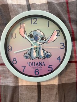 Stitch clock, notebooks, croc charms, & poster