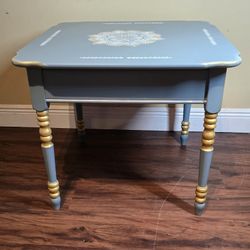 Repainted side table. green, white, and gold.