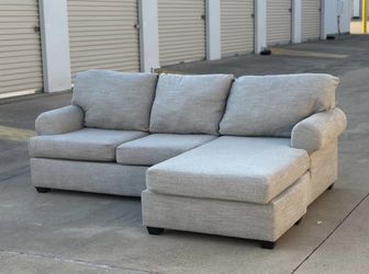 Living Spaces Light Gray Reversible Chaise Sectional Sofa
