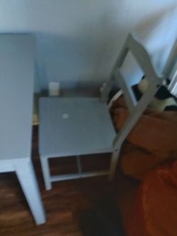 Grey dinning table with 2 chairs